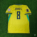 Maillot de football domicile jaune Bruno Guimarães #8 Brésil Coupe du Monde 2026